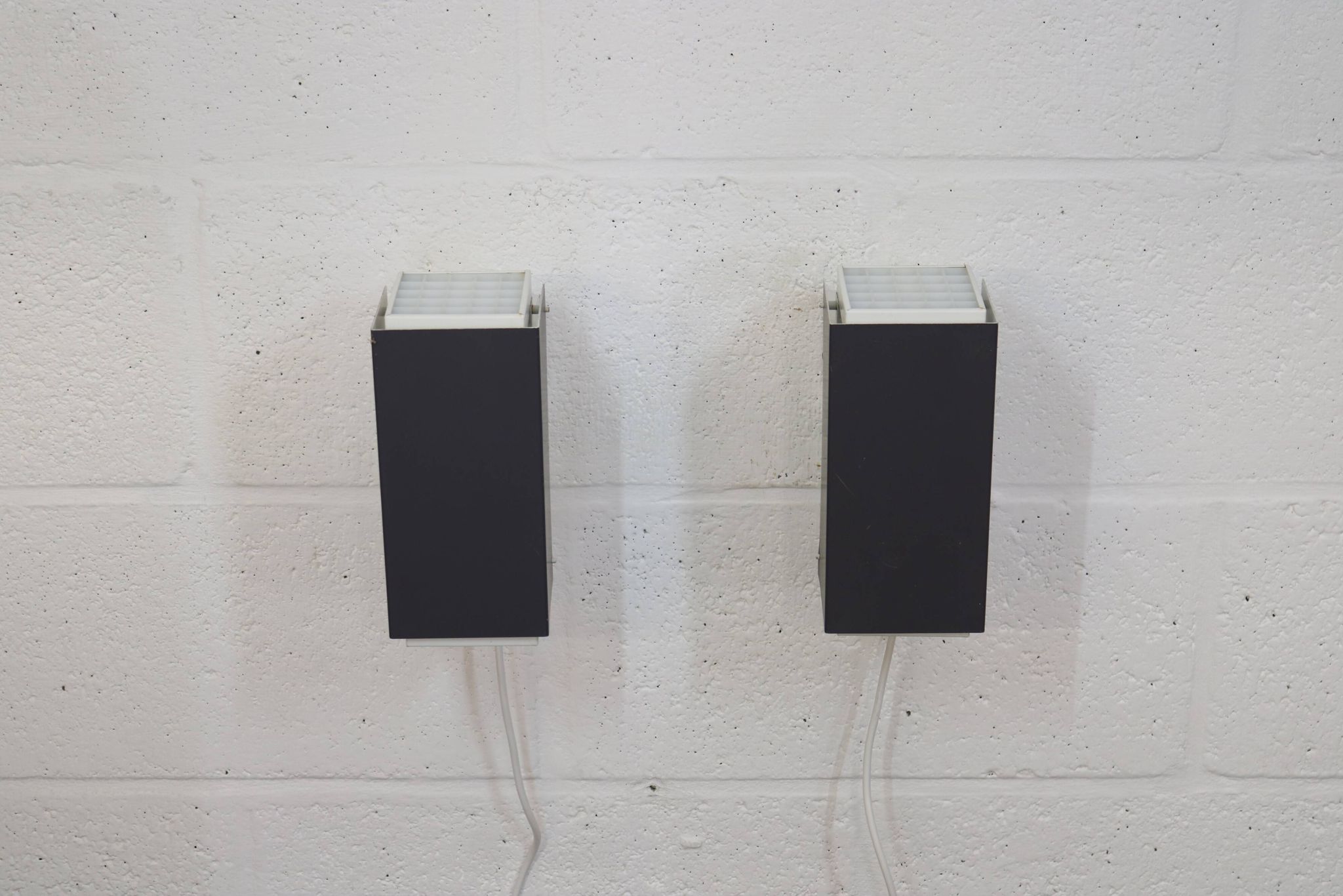 Pair of grey and white wall sconces by Preben Dahl for H. F. Belysning, 1960s