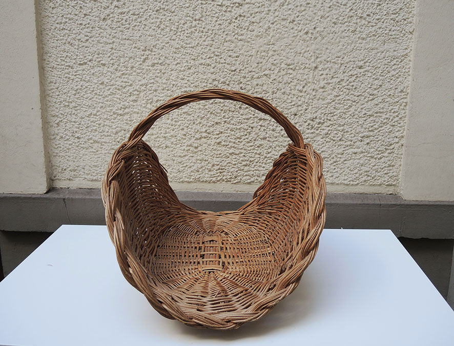 Old light wicker log basket