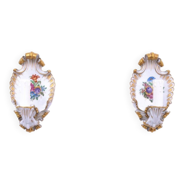 A pair of porcelain wall lamps from Capodimonte, Italy.