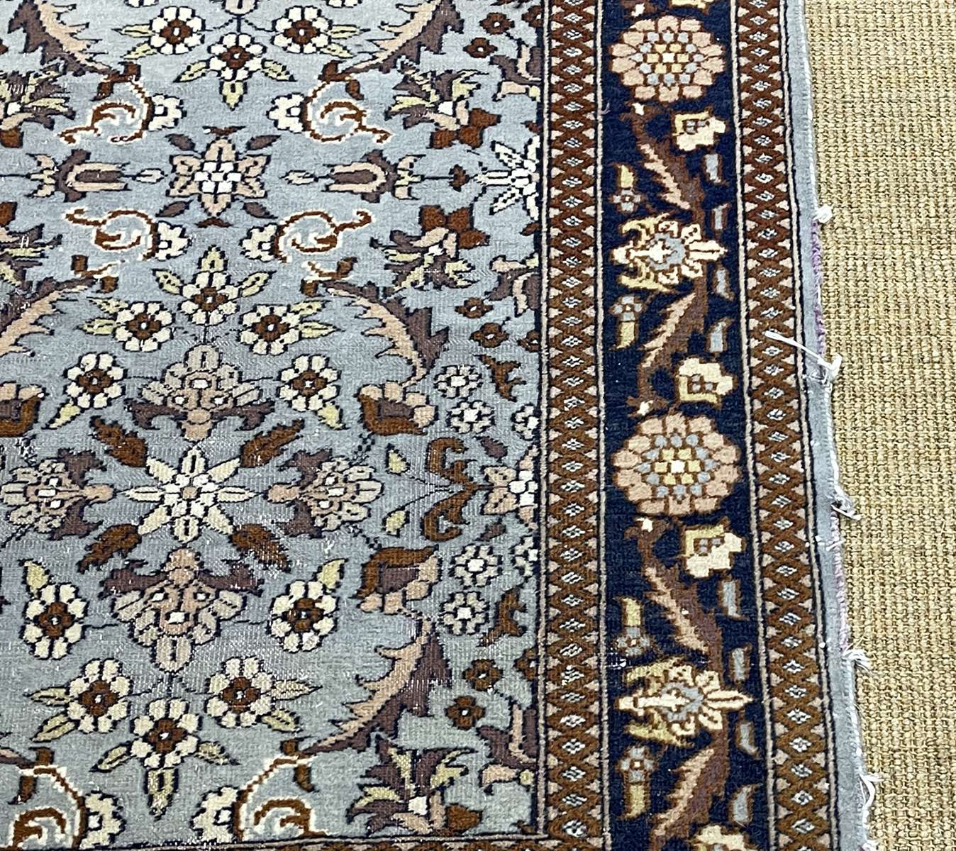 Handmade wool oriental carpet (wear defects)