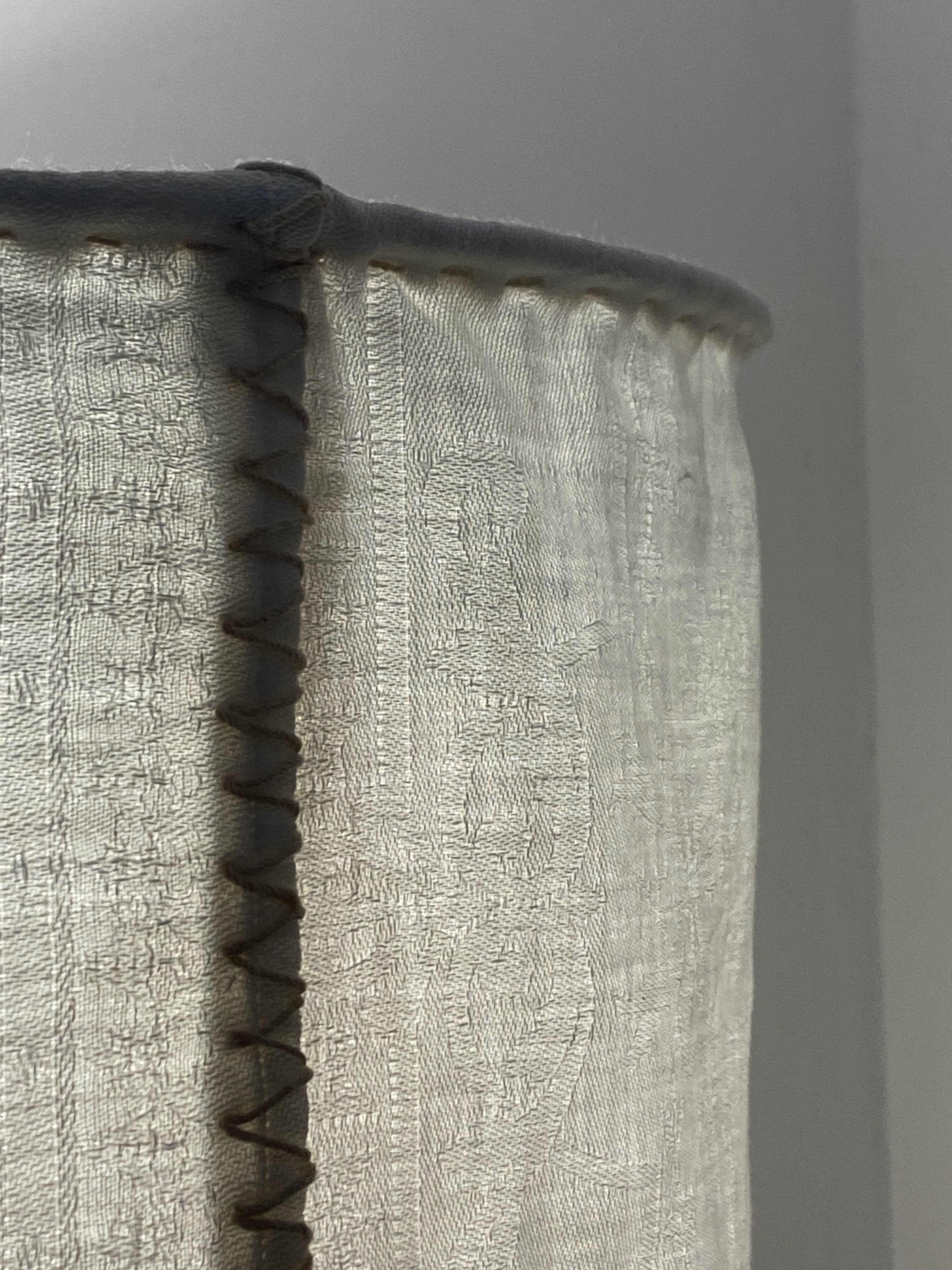 Old linen drapery with monogram and bird by Georges Braque