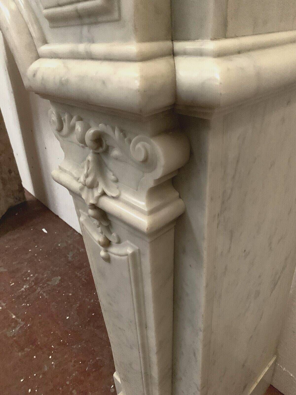 Regency style fireplace in white Carrara marble, Italy, 19th century.