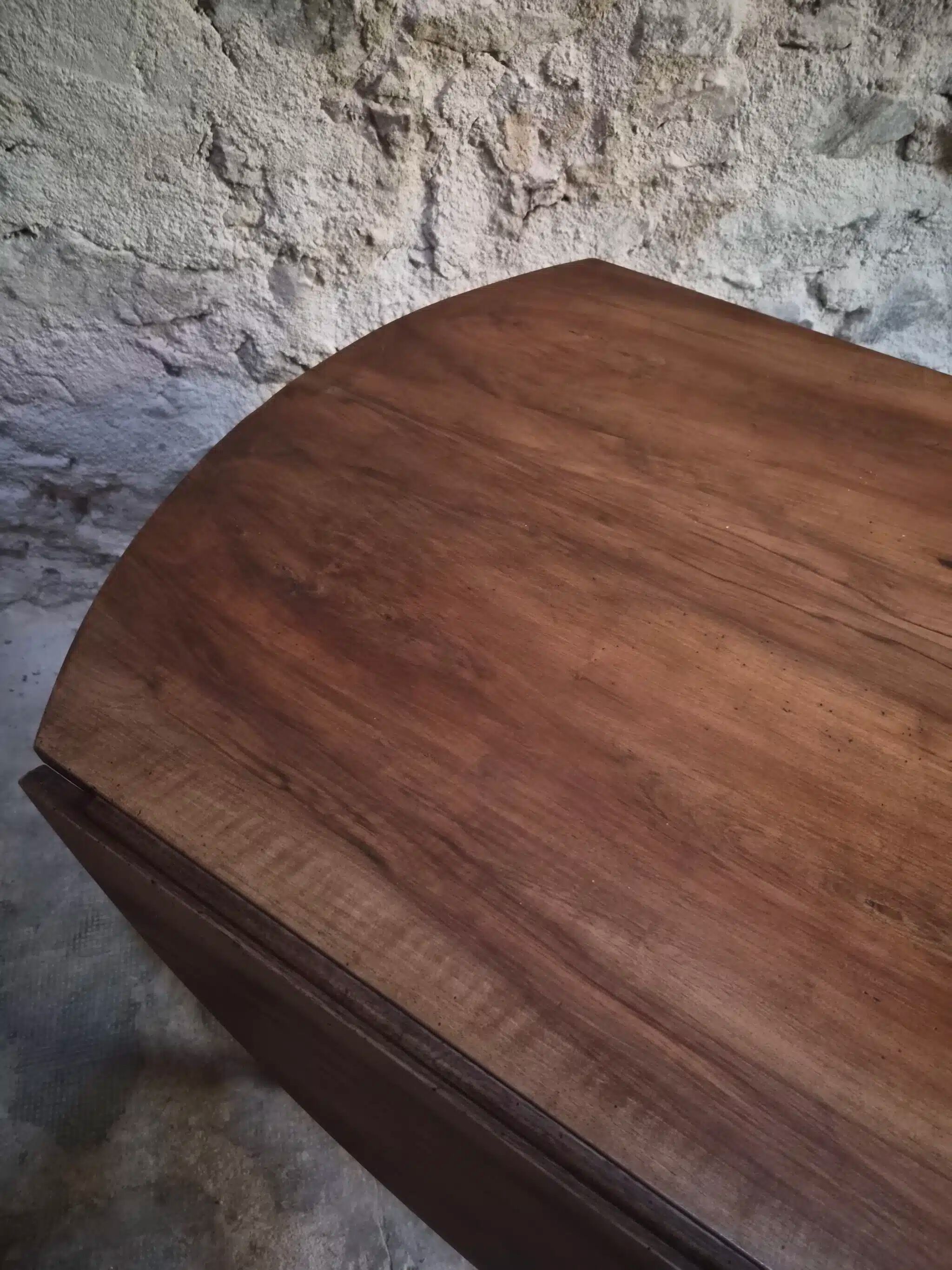 Antique drop-leaf dining table in walnut, France, circa 1900.
