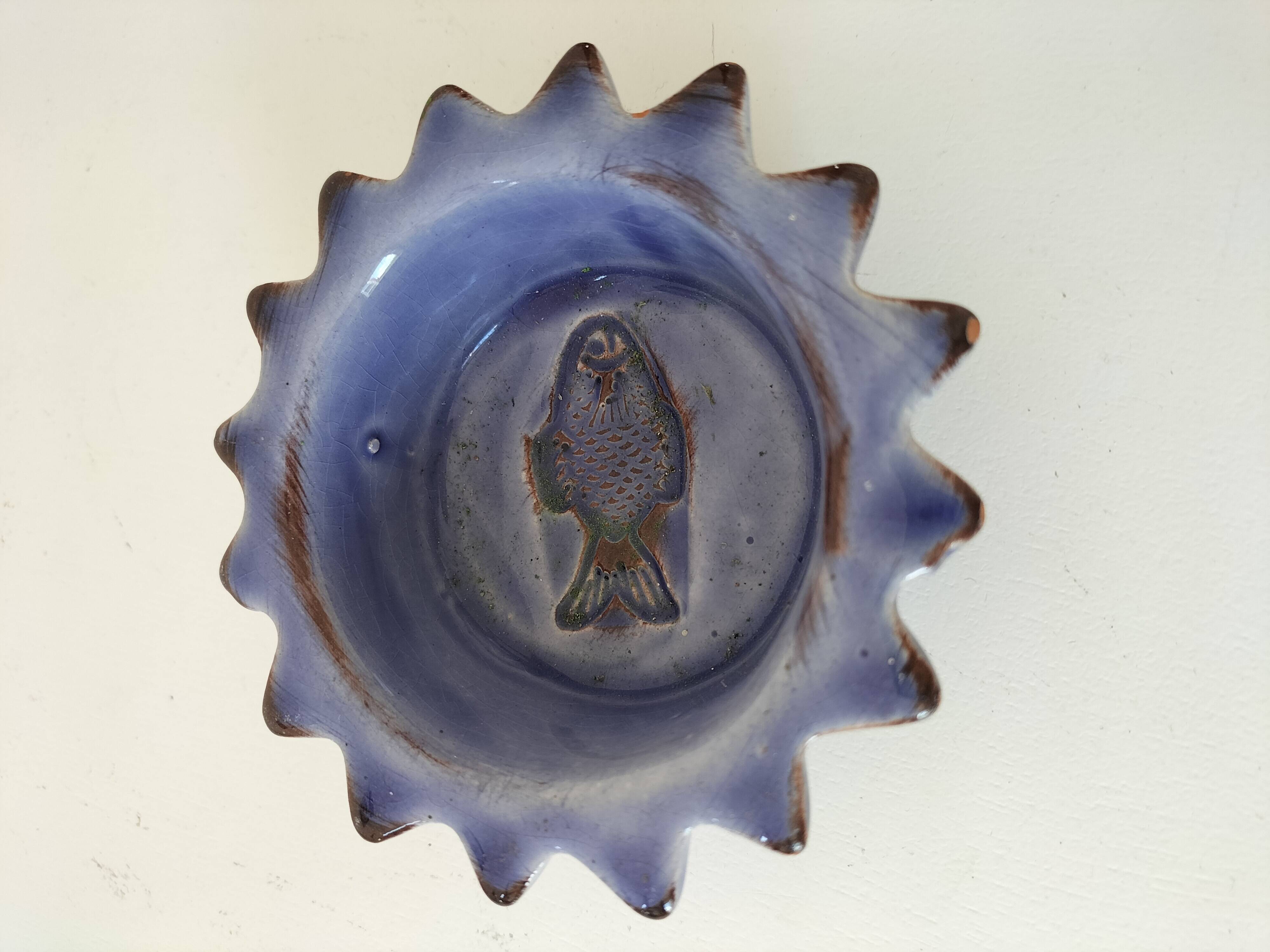 Handcrafted blue earthenware pocket emptier