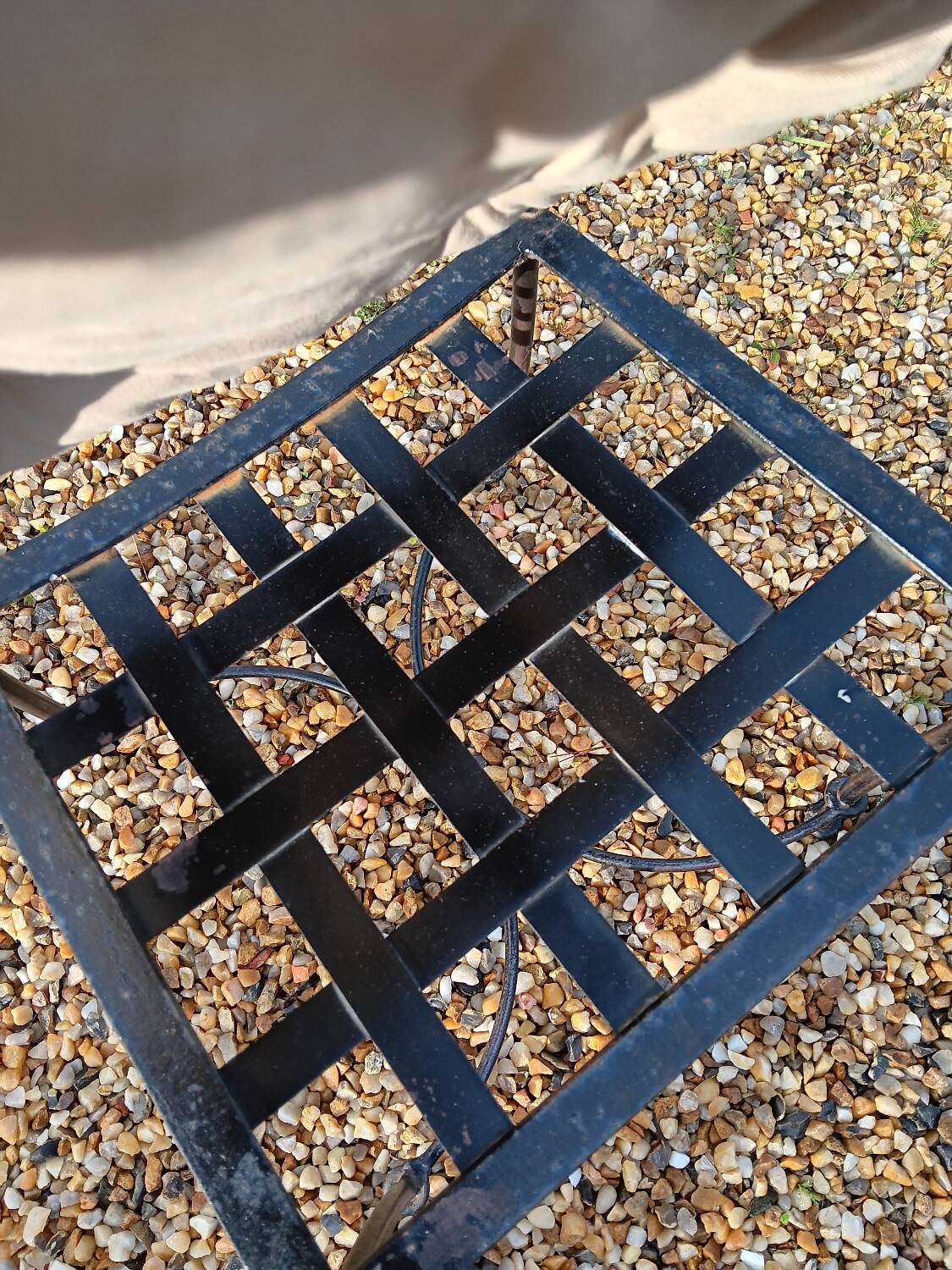 Wrought iron chairs with cushions