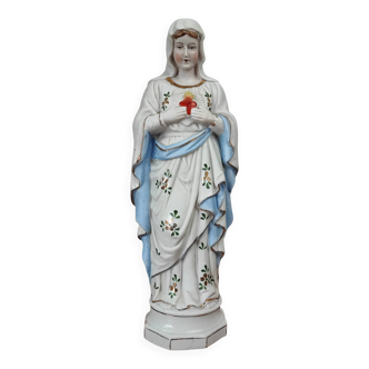 Antique religious statue of the Virgin Mary in white, blue and biscuit ceramic