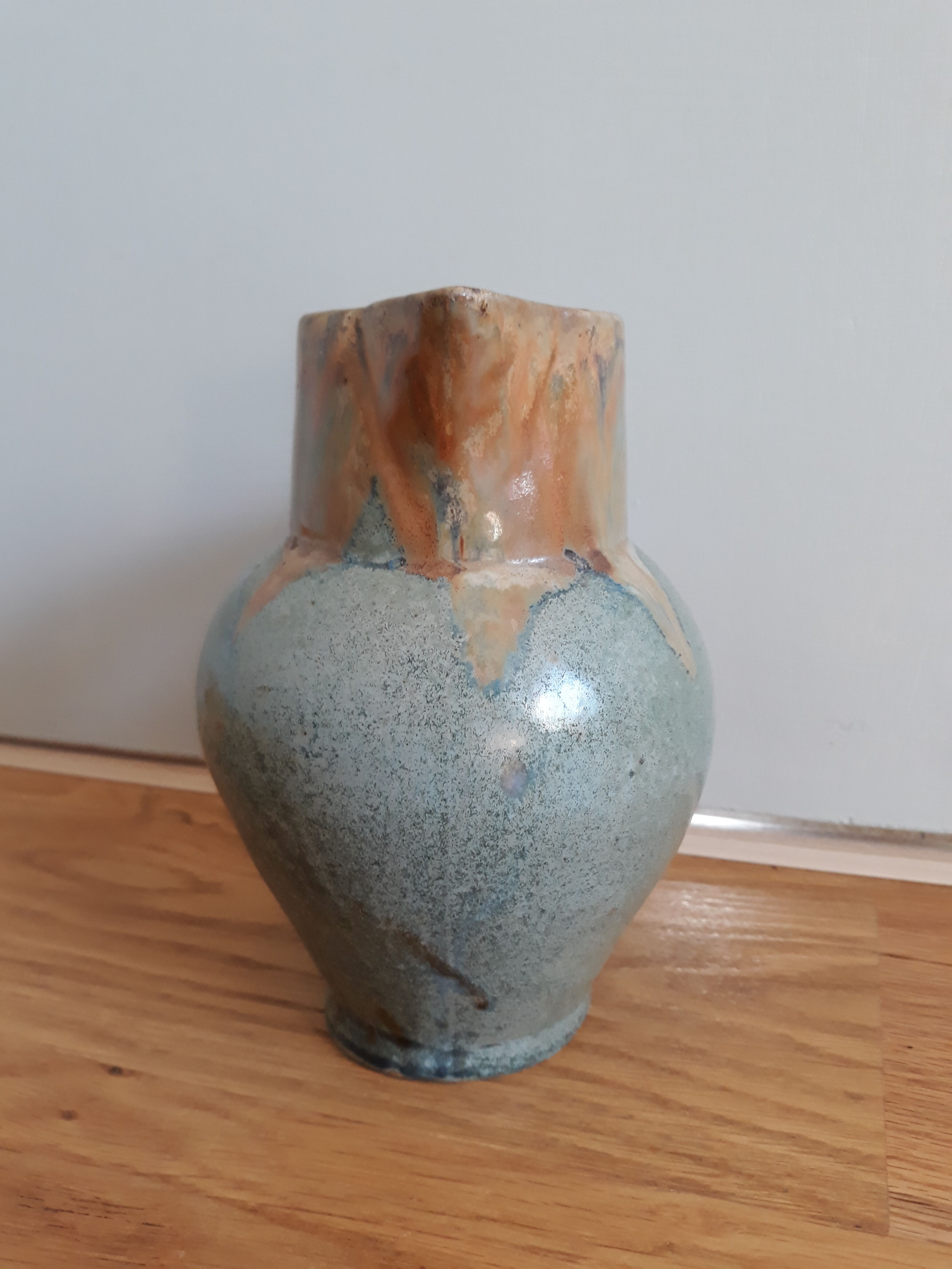 Pitcher ceramic  tones blue, green and caramel