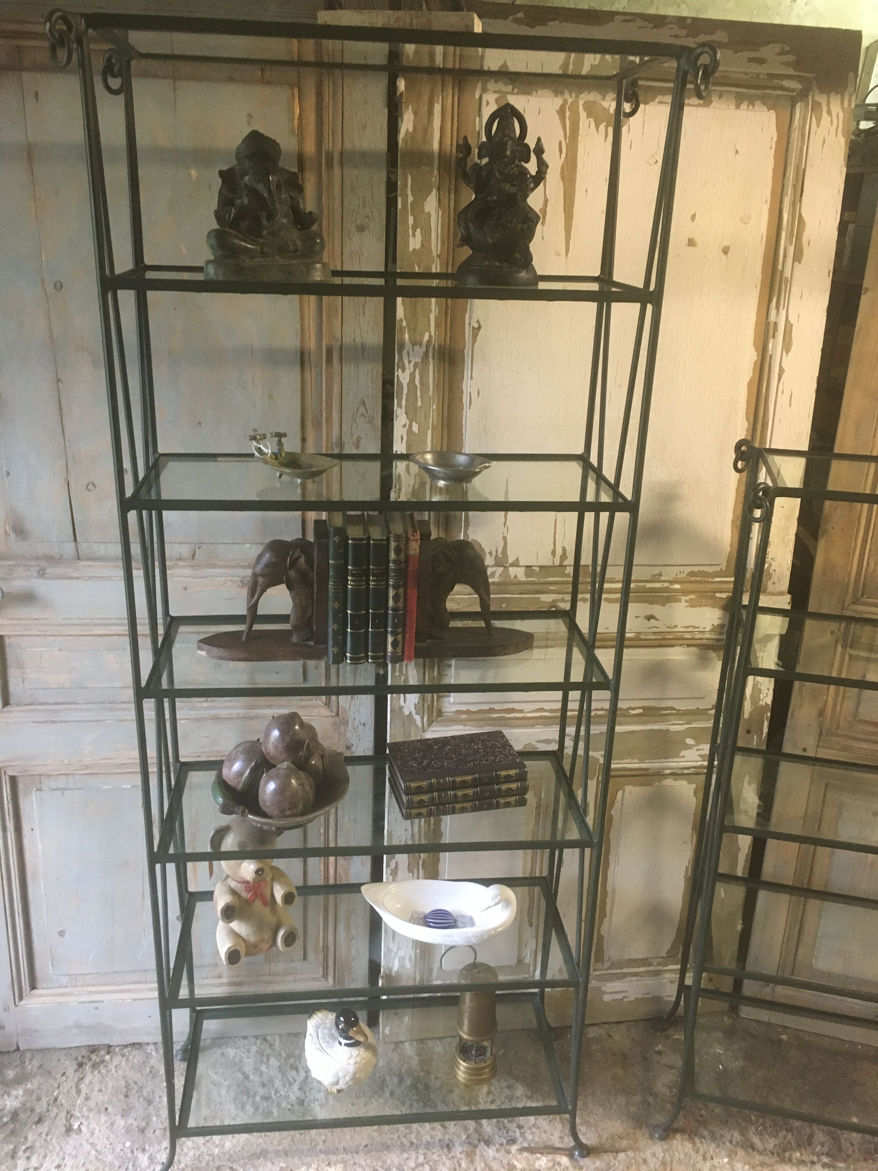 Pair of wrought iron and glass bookcase shelves