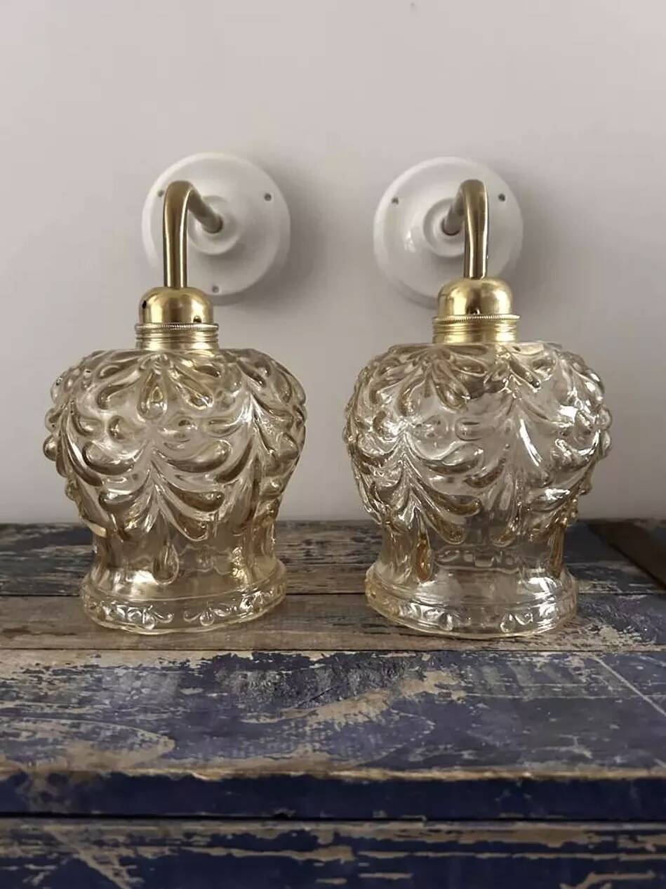 Pair of gold wall sconces