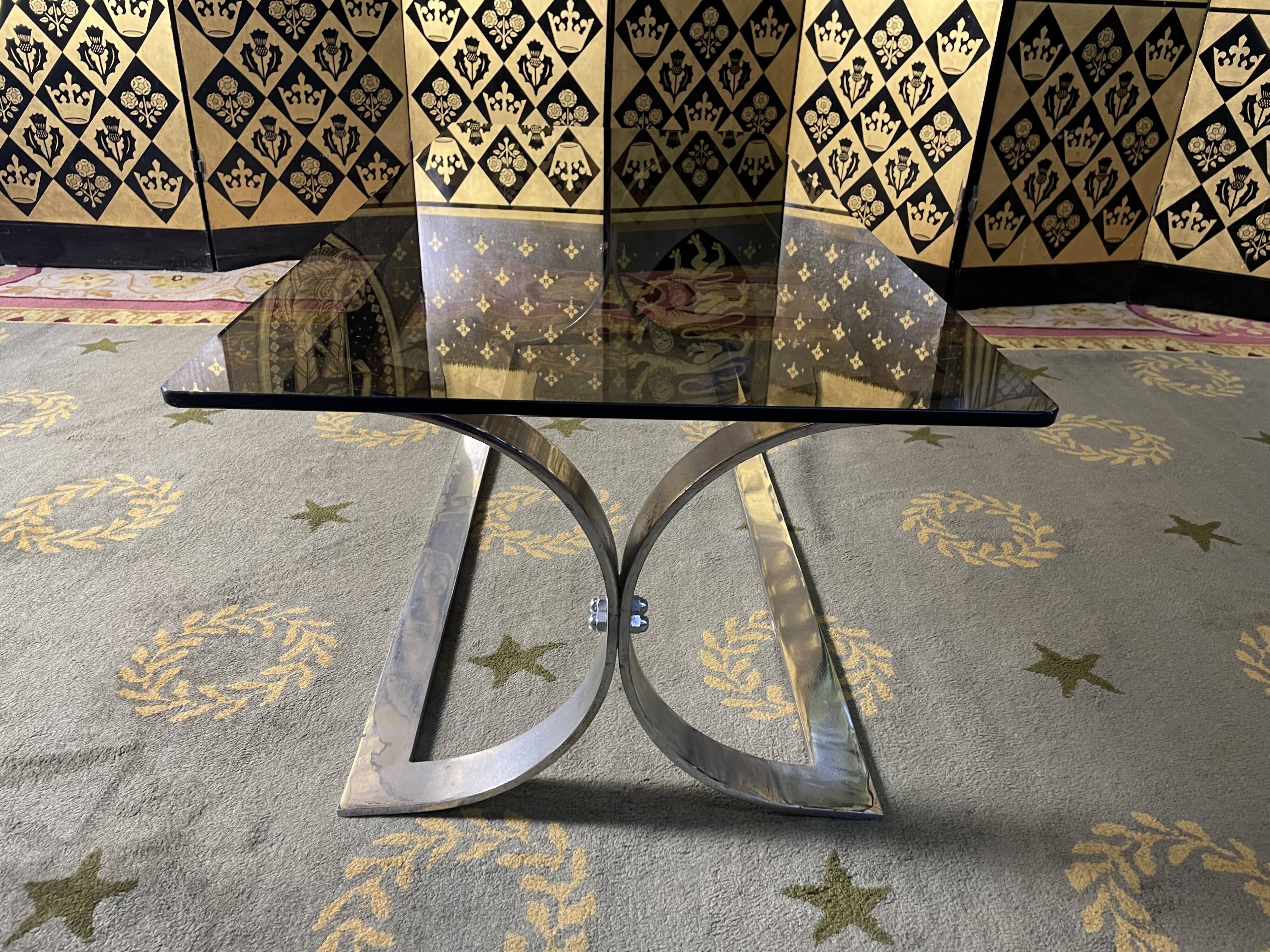 Coffee table in chromed metal and smoked glass 1970