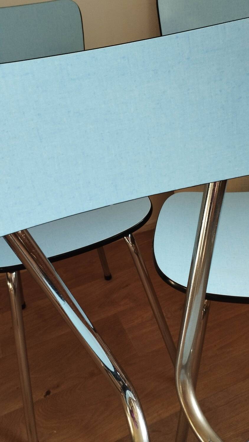 4 blue Formica chairs
