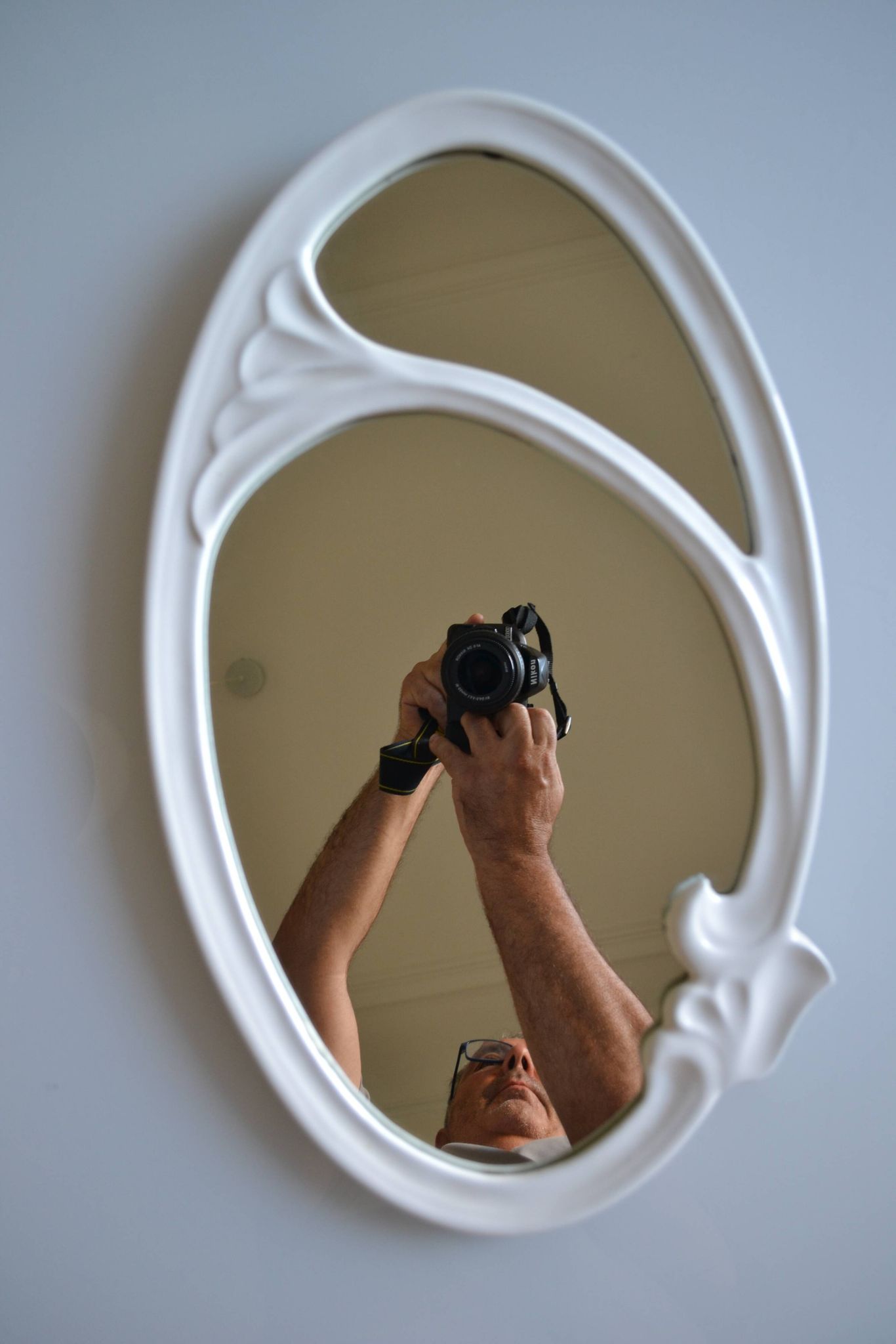 Oval mirror in art nouveau jugendstil style in enamelled cast iron 49 x 29