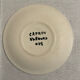 Plates and dish signed by Roger Capron, Vallauris.