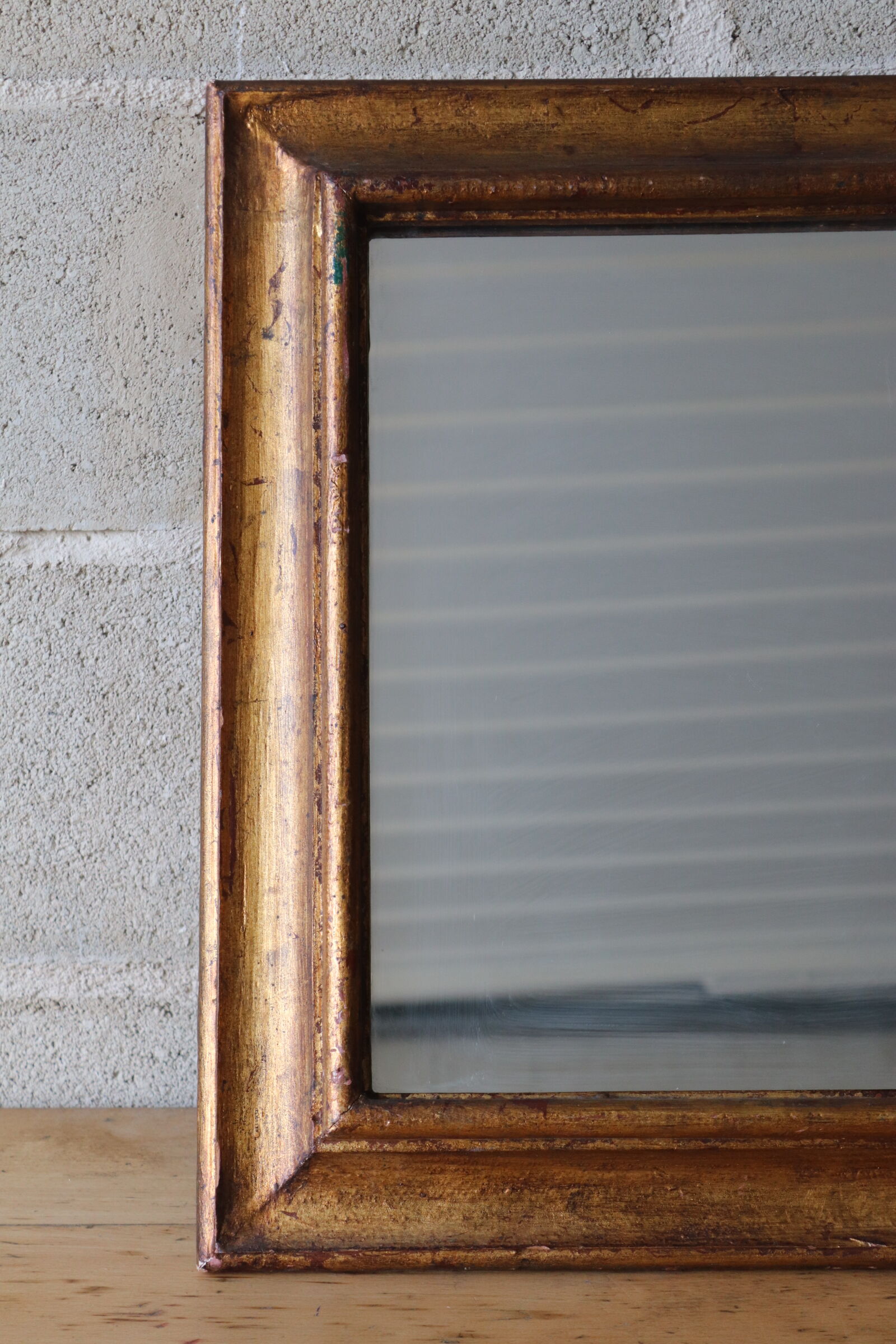 Miroir ancien en bois doré 42x52cm