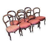Series of 7 solid walnut chairs circa 1870