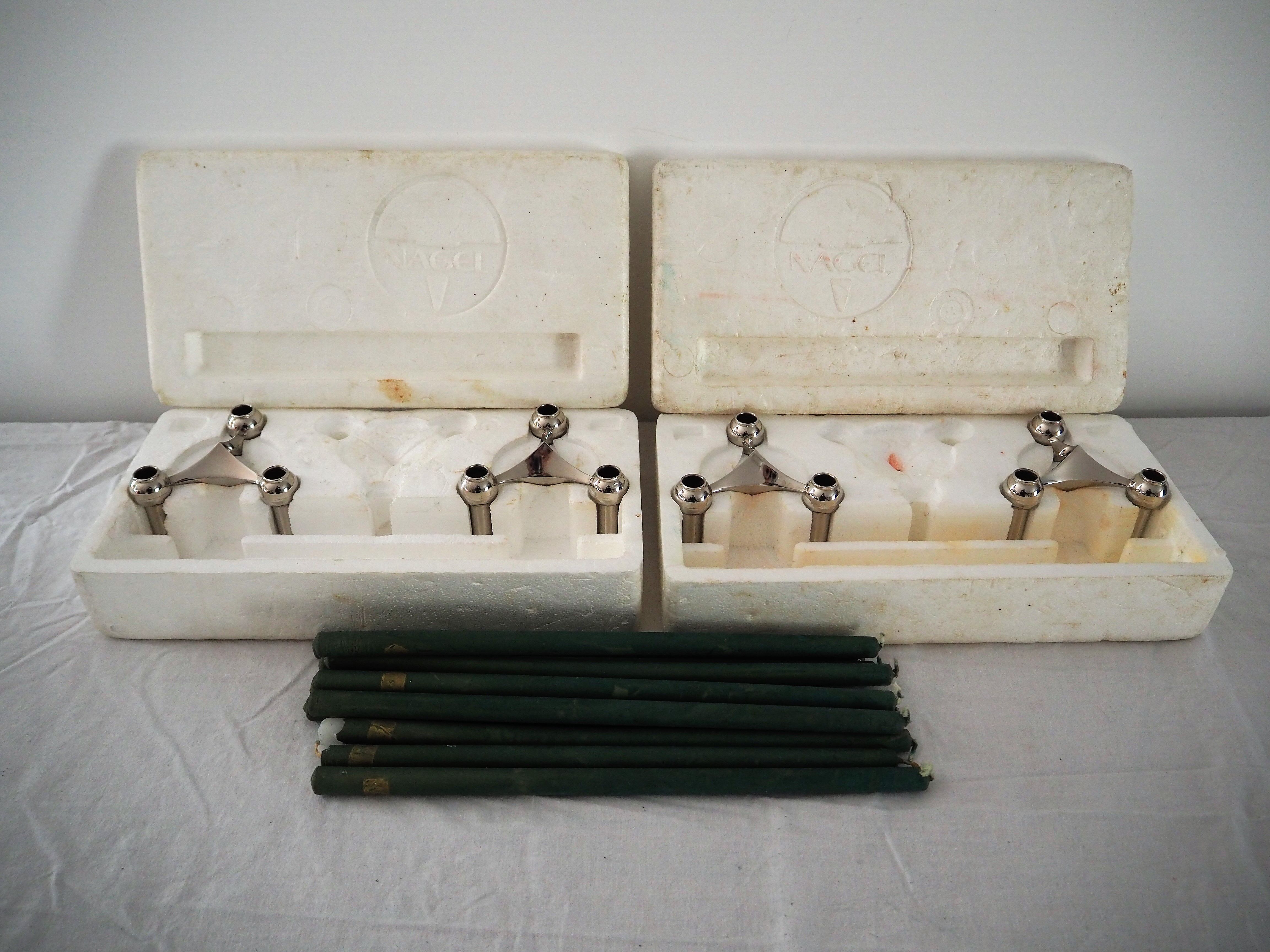 Lot de 4 bougeoirs Nagel dans leurs boites d’origine et un lot de 11 bougies originelles de couleur