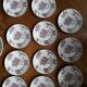 Set of 11 dessert plates and an English ceramic dish