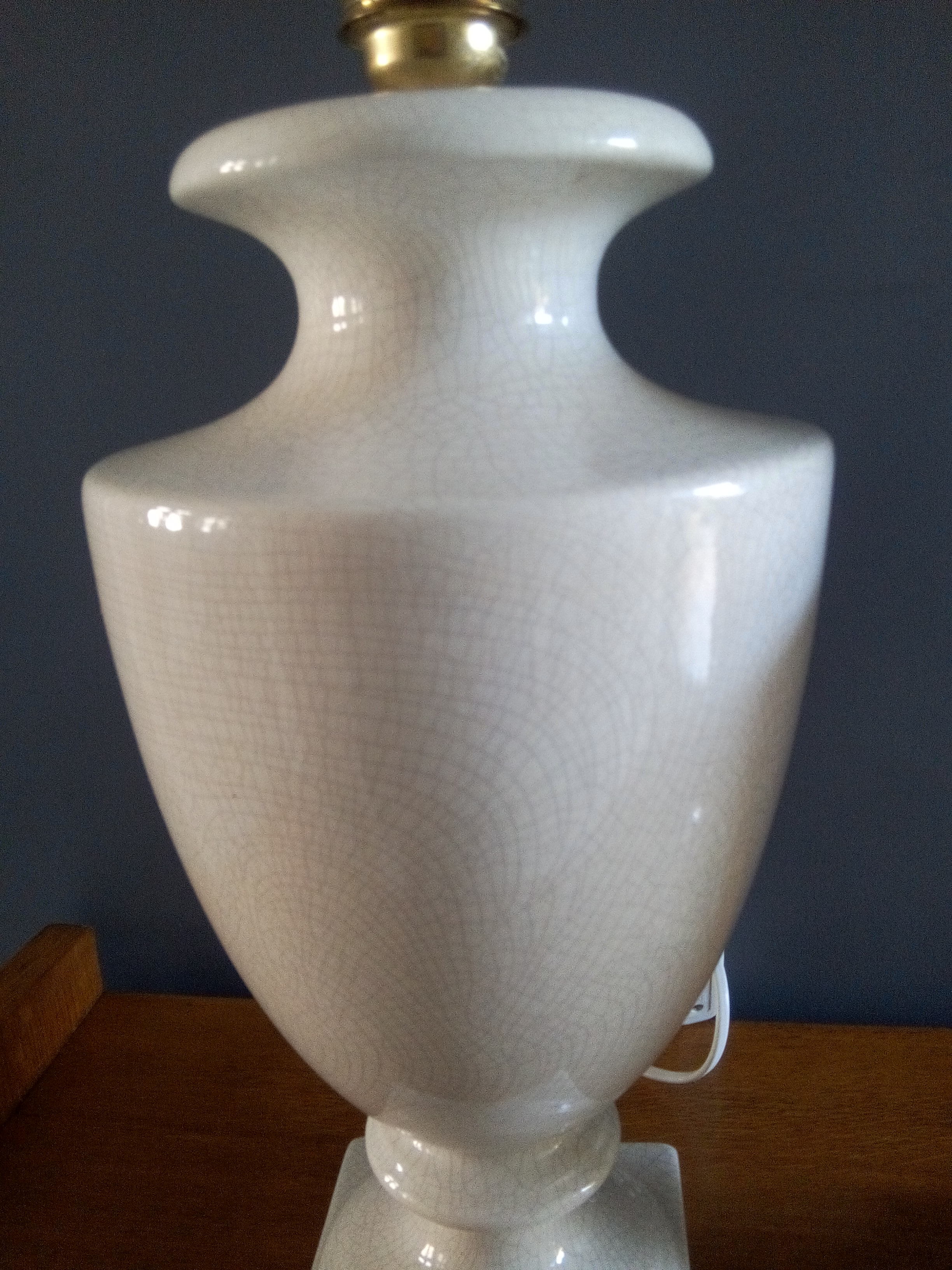 Pair of legs of cracked earthenware lamps