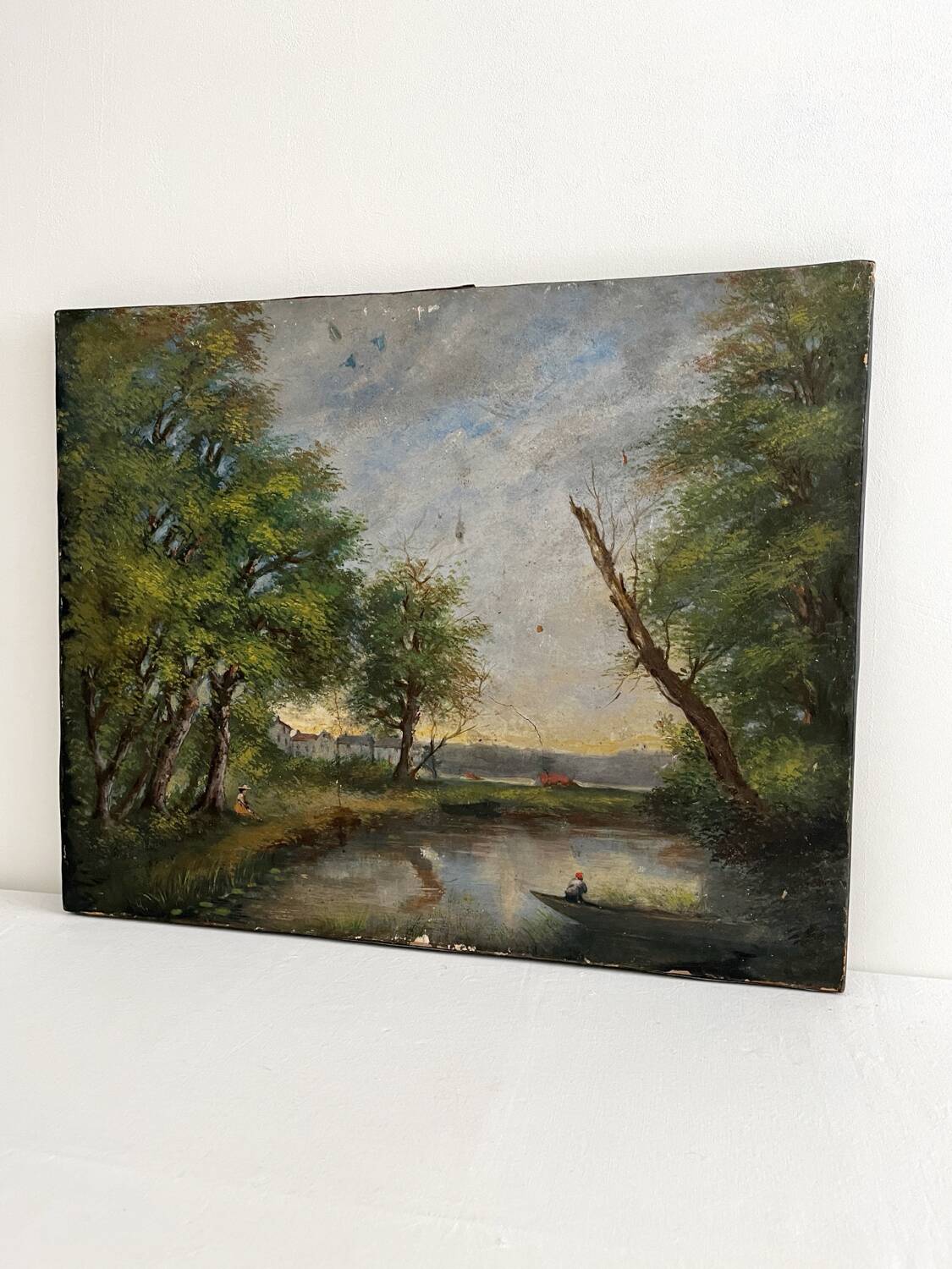 Old oil painting on canvas of a landscape by the pond.