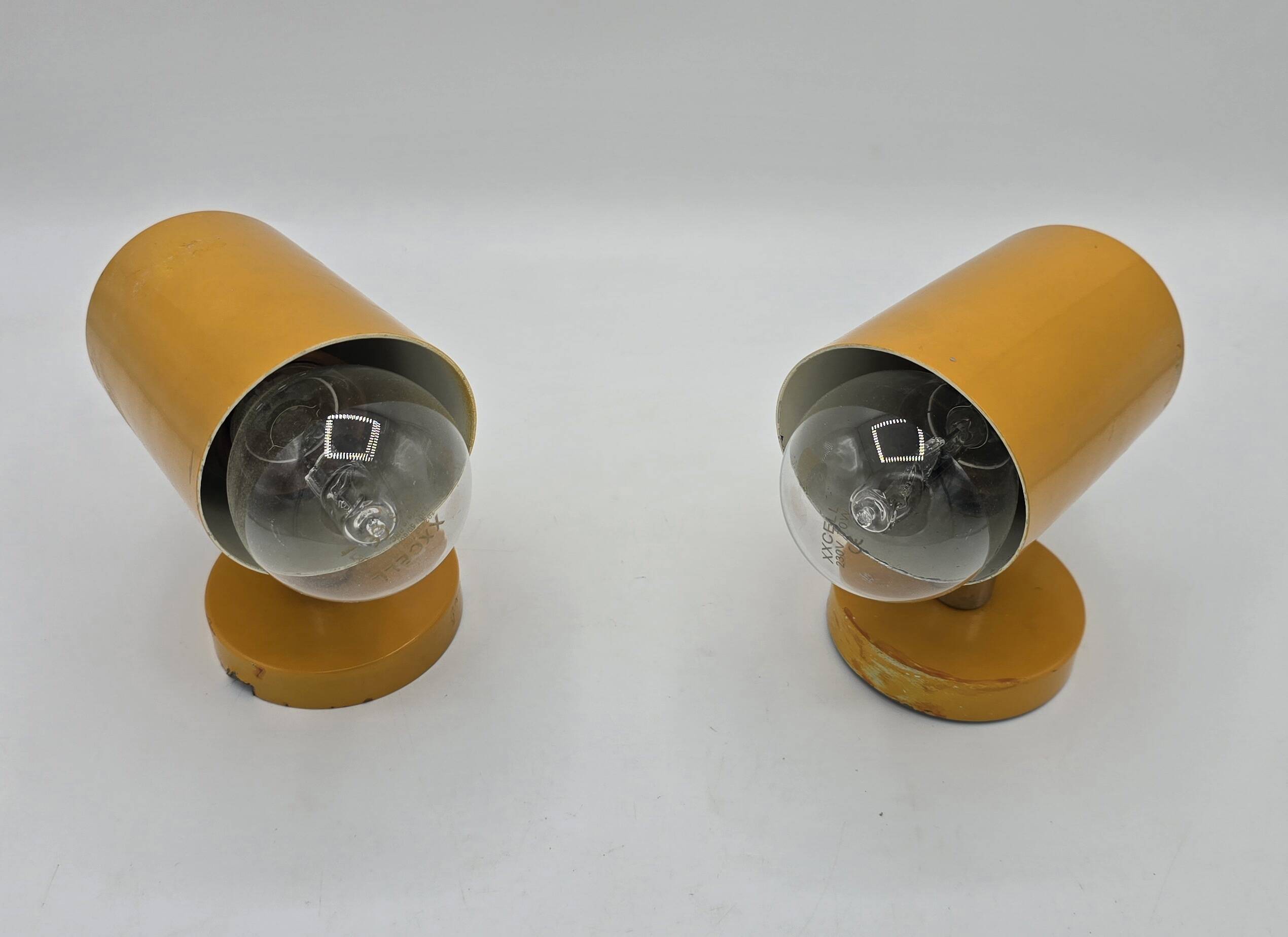 Pair of yellow Space Age wall lights from the 1960s.