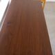 Small Italian wooden desk with brass details.