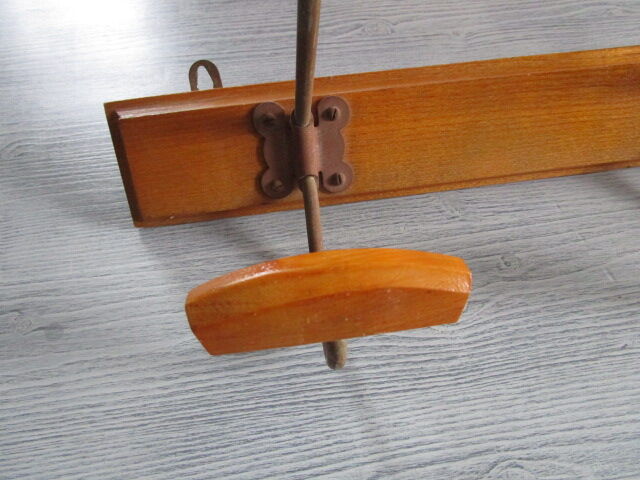 Old coat hangers in wood and metal
