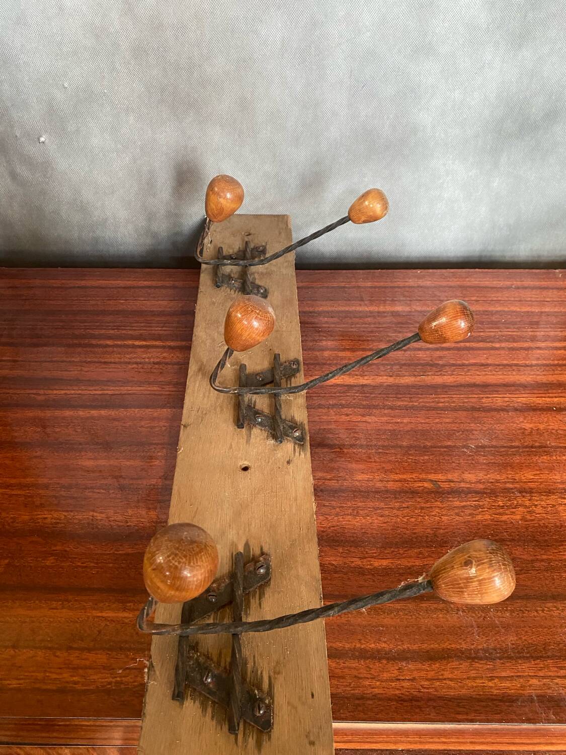 Old wooden wall coat rack + 3 wrought iron hooks & vintage wooden ball
