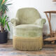 Fauteuil crapaud en velours vert pistache vintage