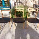 5 Scandinavian style chairs, wood and black faux leather.