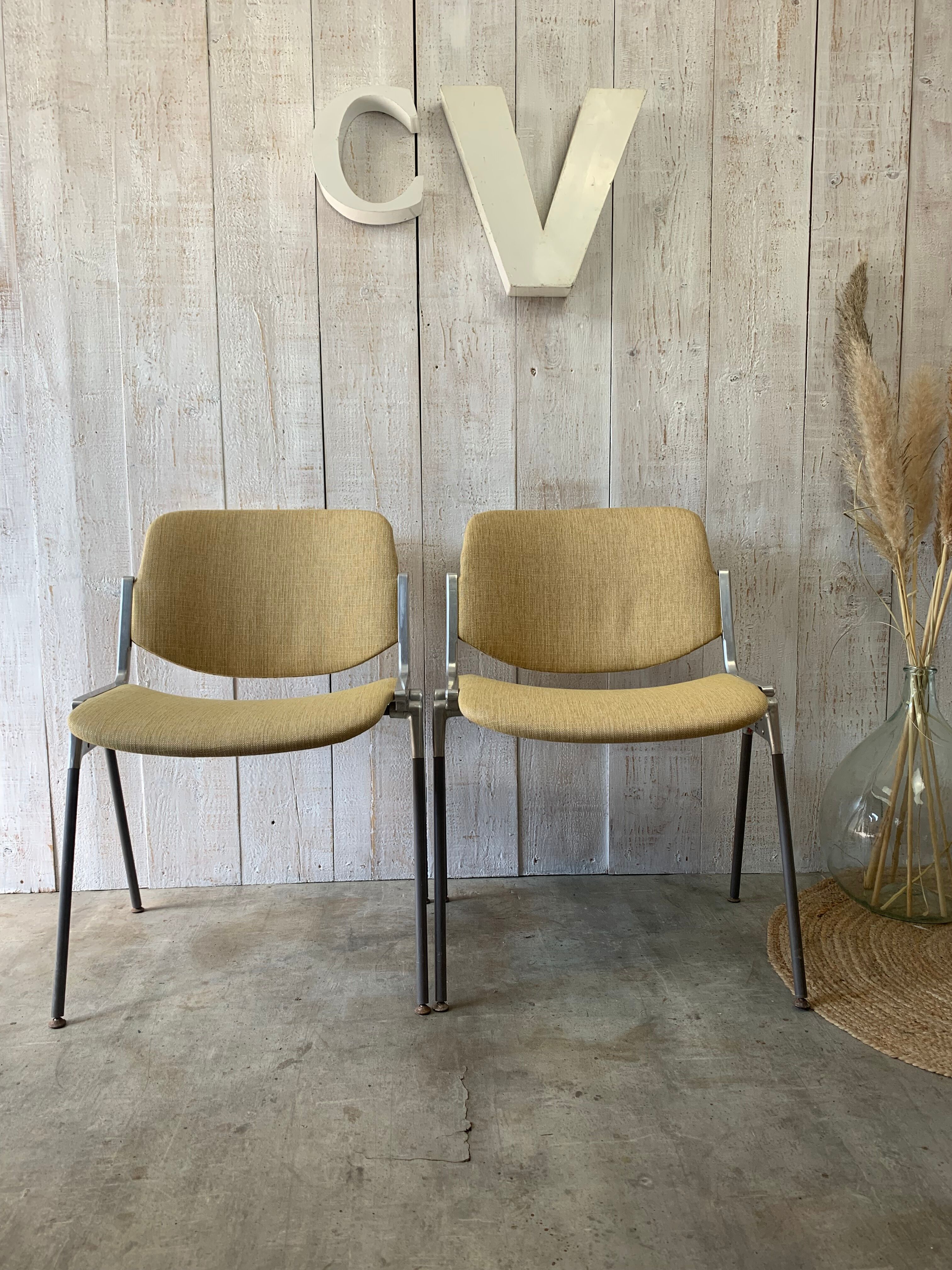 Pair of yellow Castelli chairs