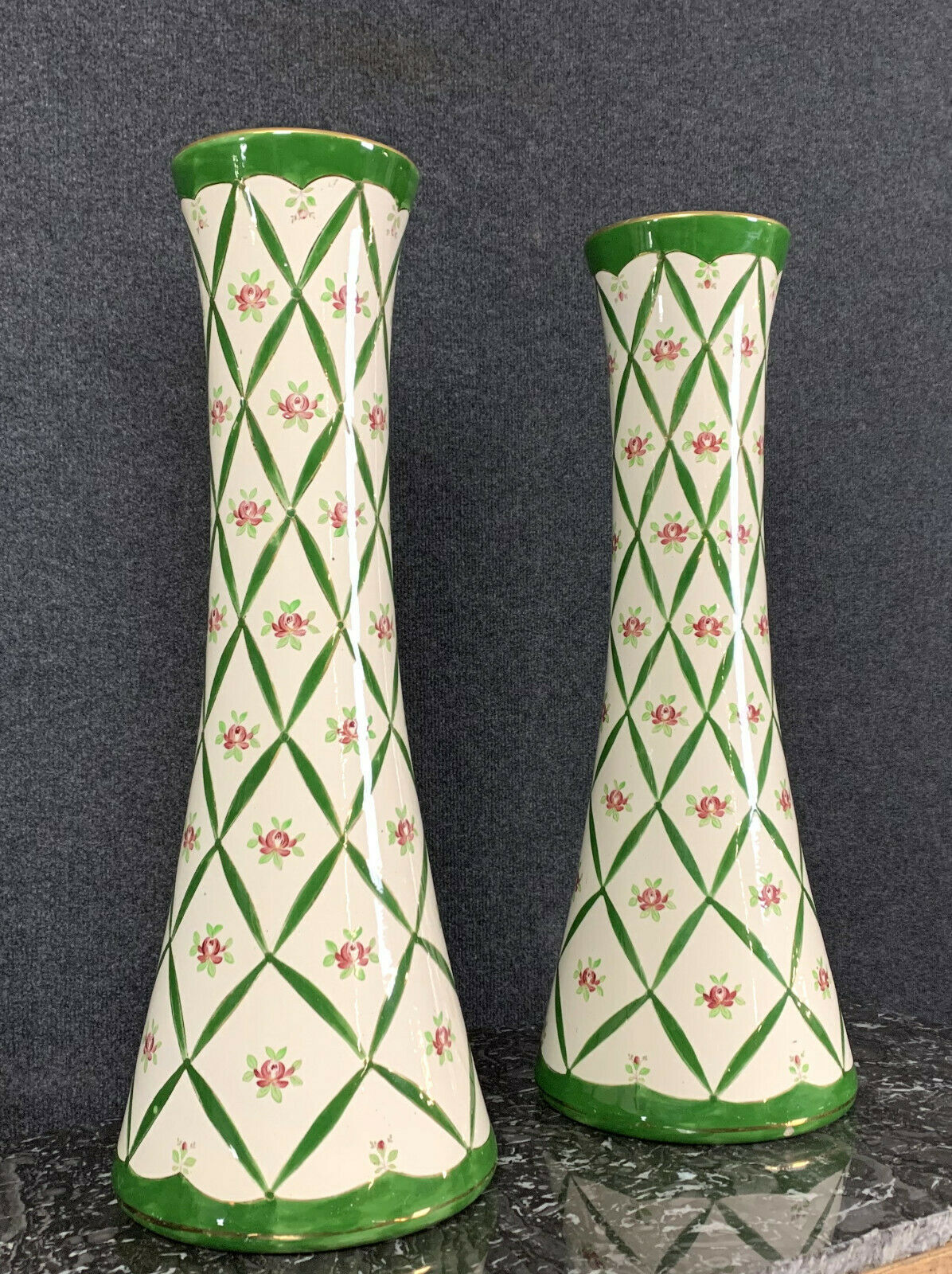 Pair of cornet vases in fine earthenware decorated with flowers in a green mesh