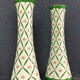 Pair of cornet vases in fine earthenware decorated with flowers in a green mesh
