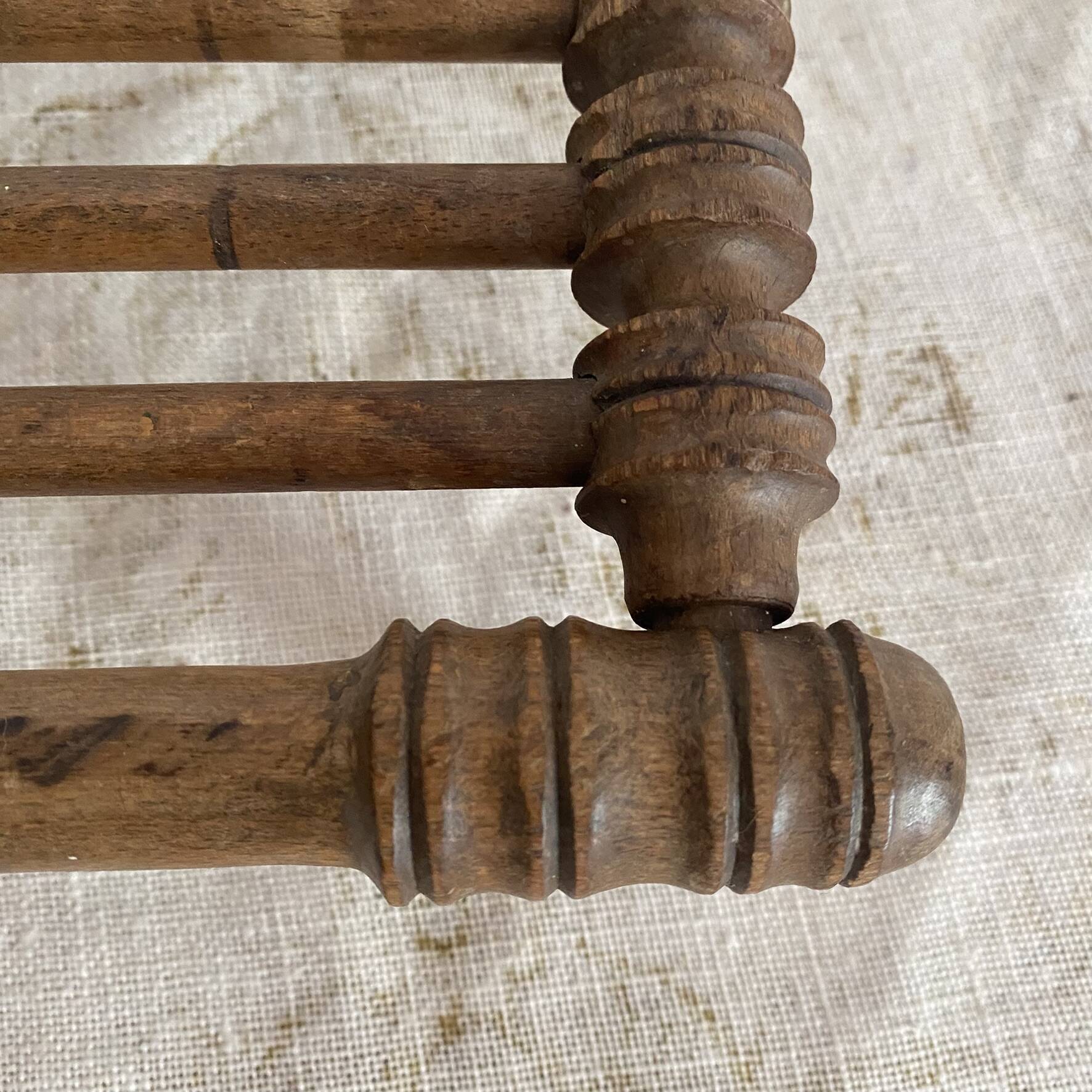 Old low turned wooden stool