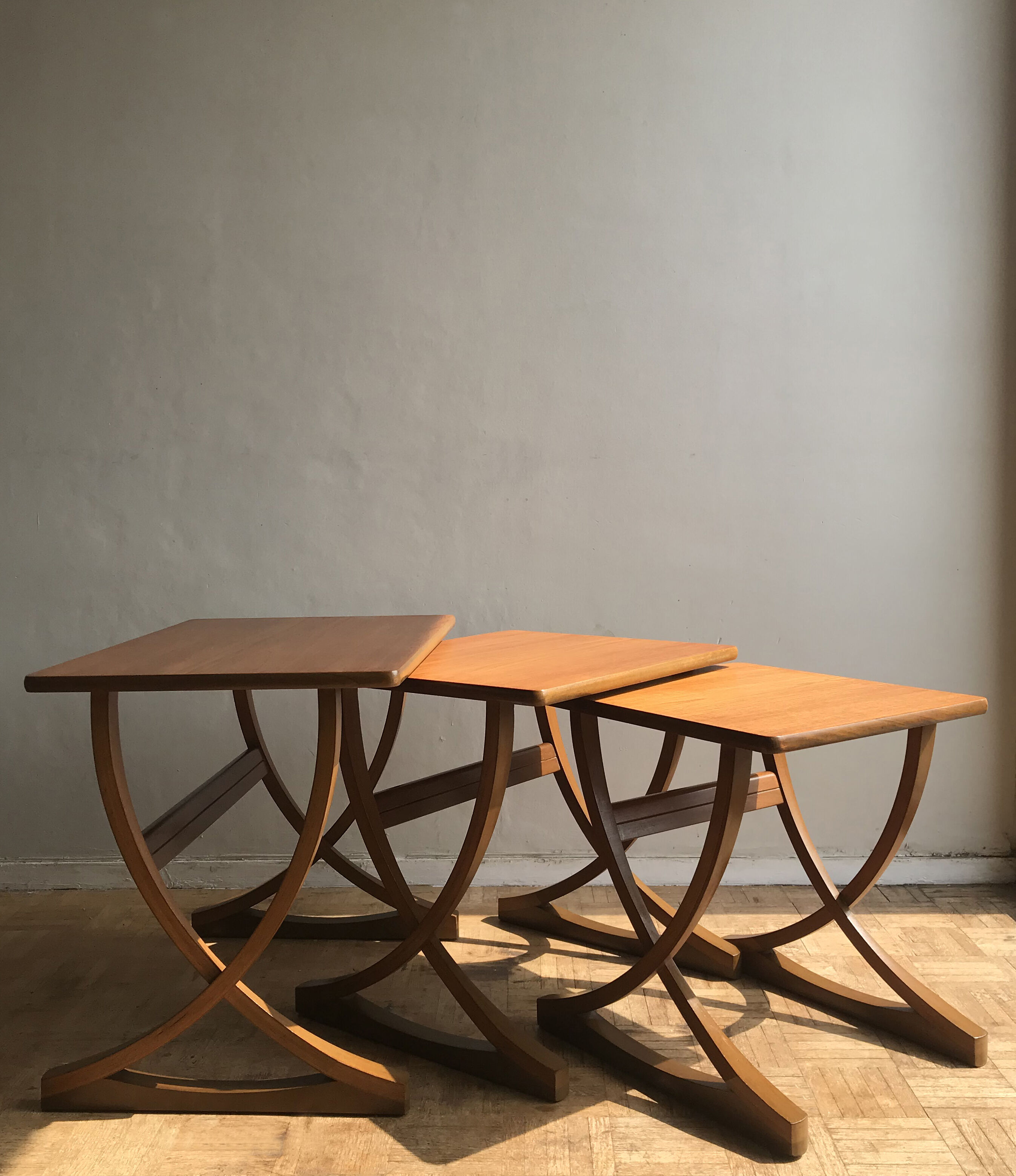 Set of 3 nesting tables from Nathan editions in teak and beech.
