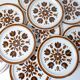 10 flat earthenware plates
