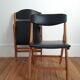 Set of 2 folding chairs in wood and skai