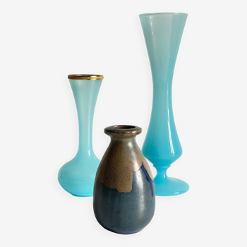 Blue vases in stoneware and vintage opalin glass