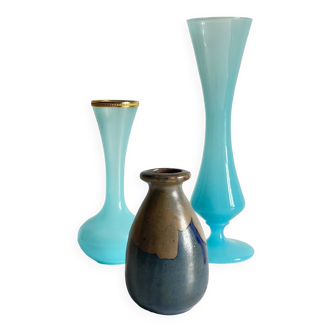 Blue vases in stoneware and vintage opalin glass