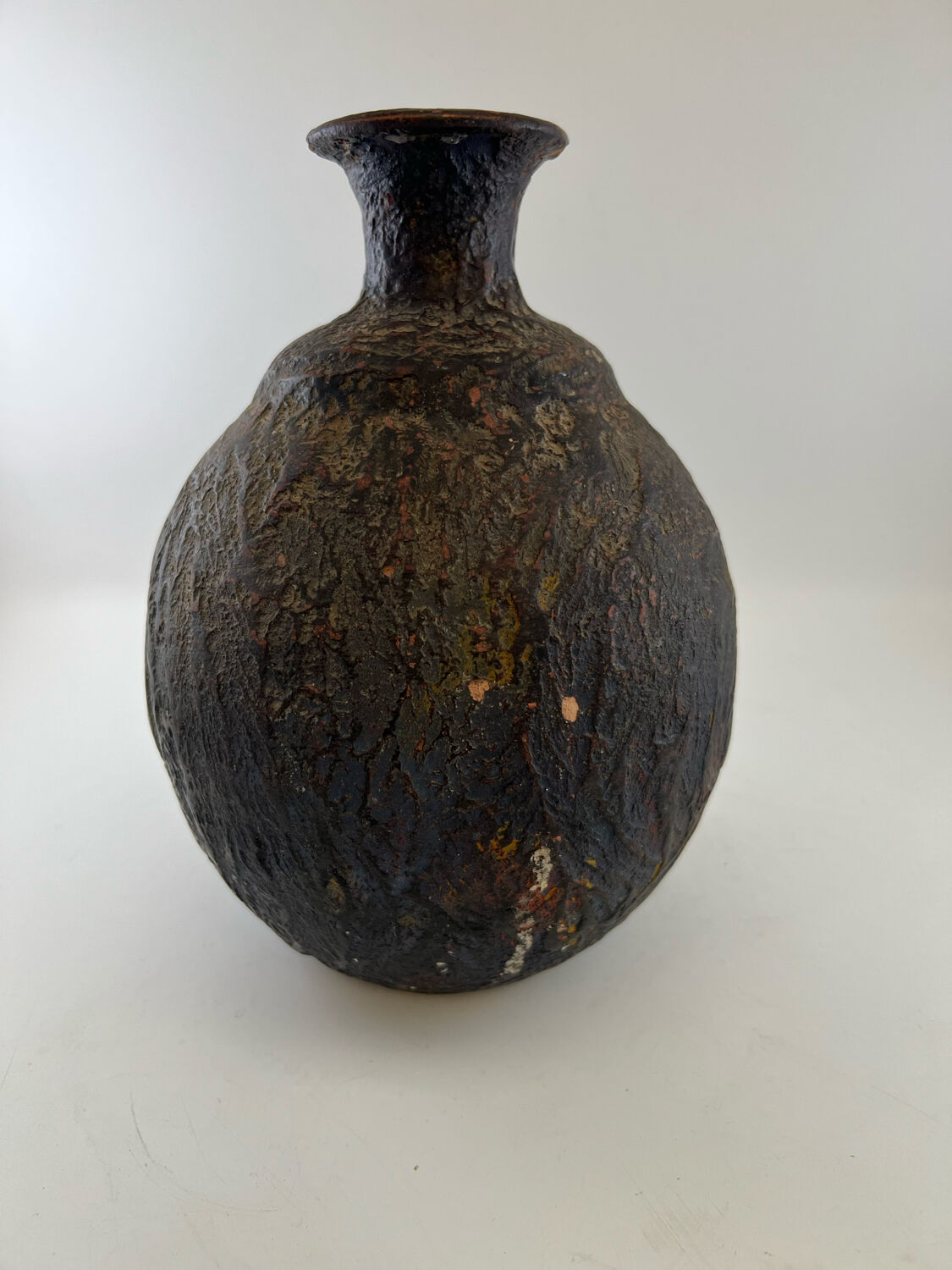 Iridescent black ball vase