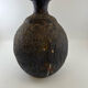 Vase boule noir irisé