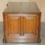 Antique double-sided desk C Hindley & Son in oak and leather