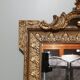 Mirror with pediment rocaille in gilded wood and stucco Louis XV style