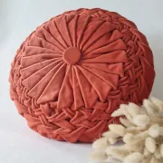 Pleated terracotta red velvet cushion