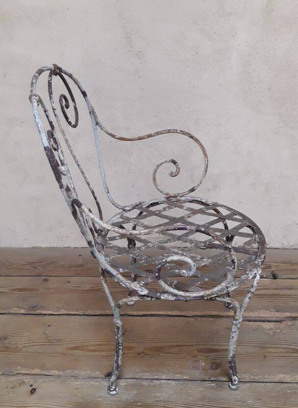 19th-century garden armchair in wrought iron