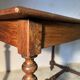 Antique solid wood table with turned legs