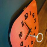 Vintage wall clock from the 50s in red formca