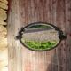 Art Deco mirror in wrought iron and beveled glass
