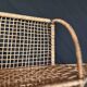Steel and wicker wall shelf