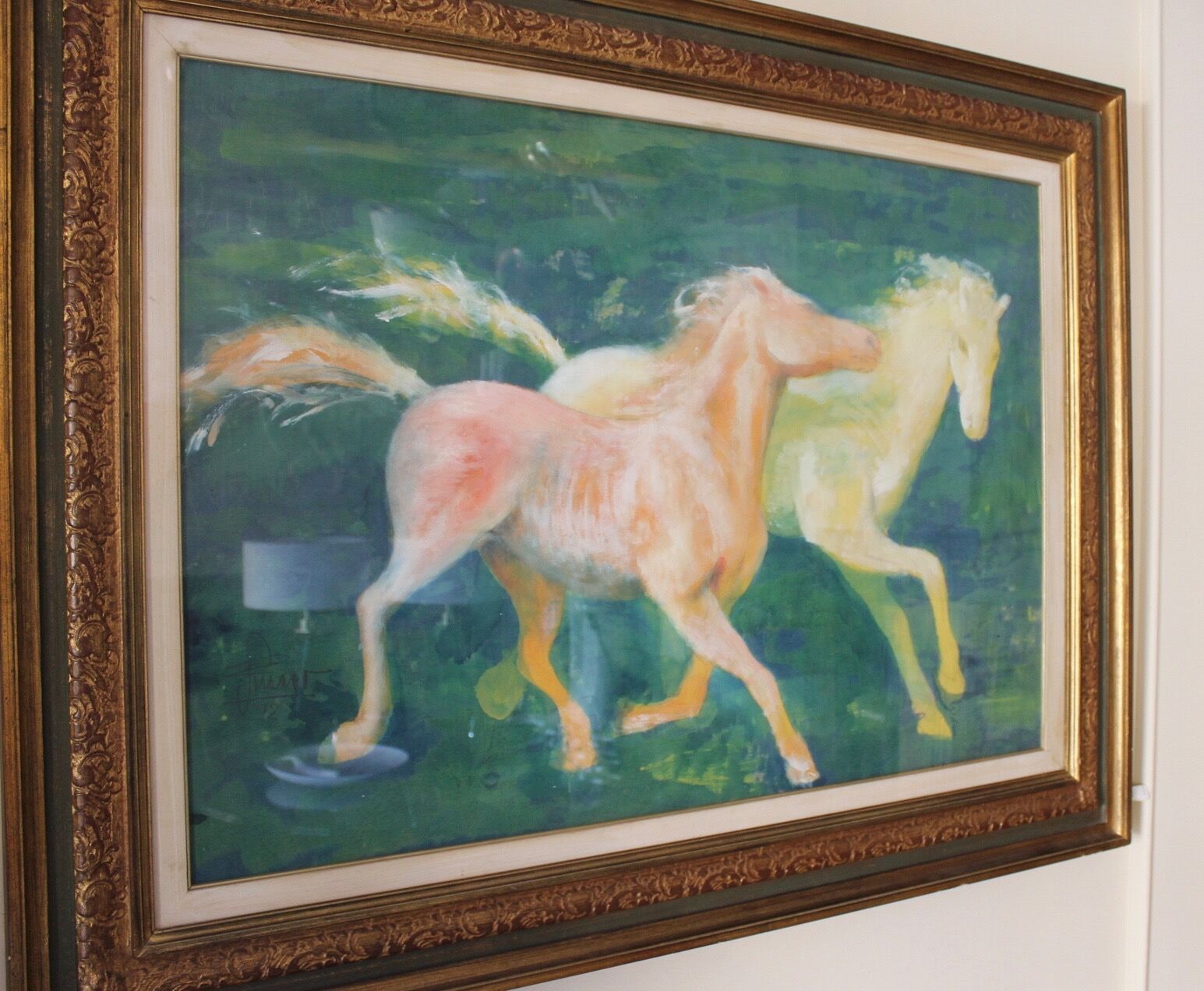 Framed painting representing horses, signed, XX th