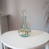 Old carafe bluish glass
